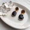 Pendientes de acero con pieza onix